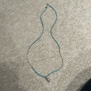 Good Charma necklace with turquoise and silver mini beads. 32 inches long.